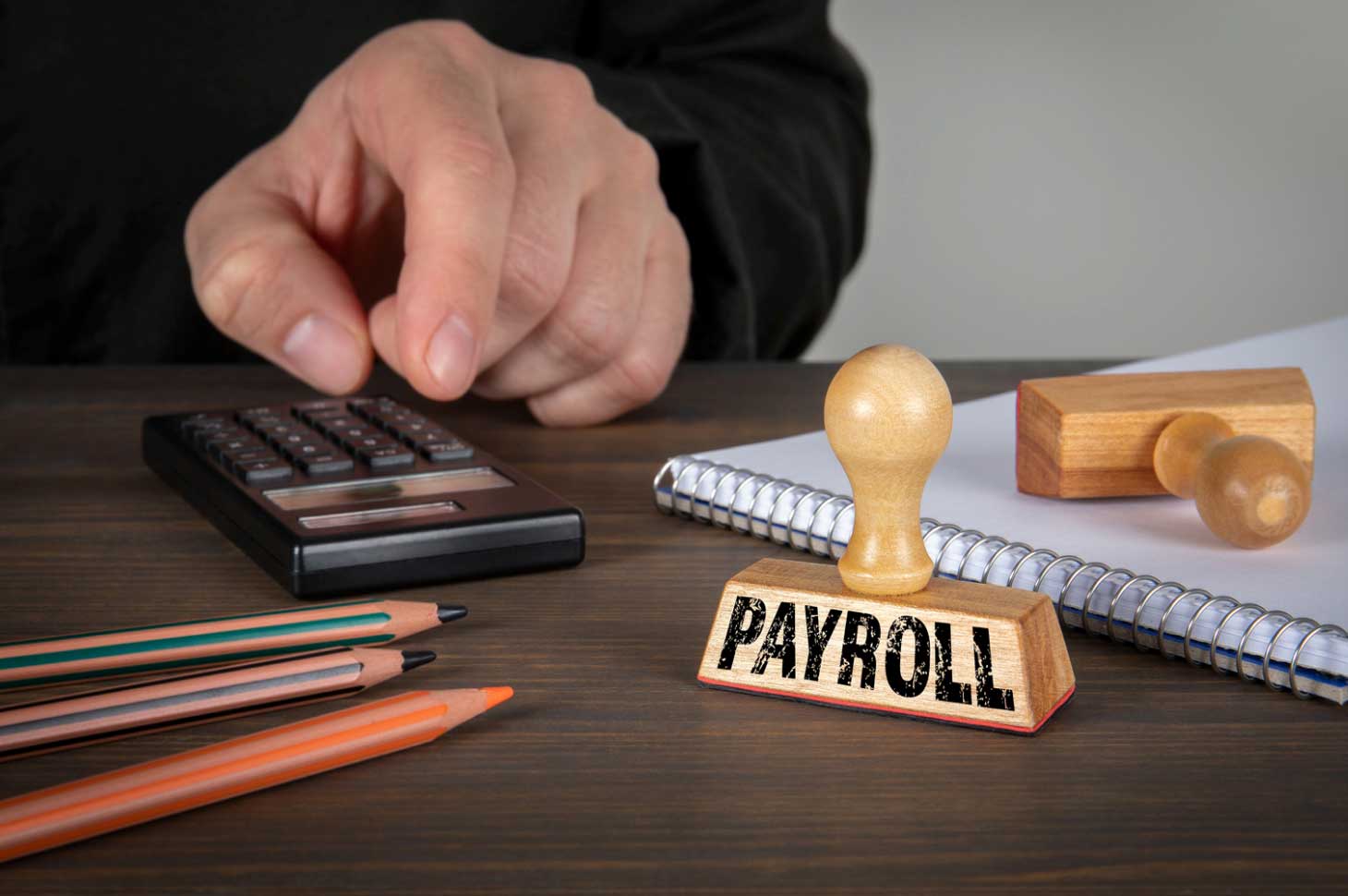 How Payroll Outsourcing Helps Businesses Stay Compliant with Government Regulations